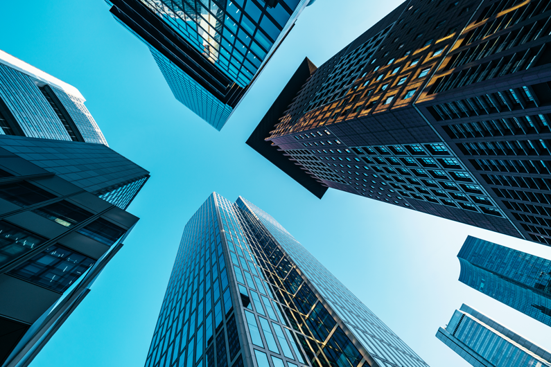 View of modern skyscrapers reflecting the sky.