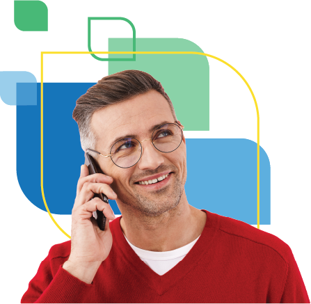 Man smiling using the phone. 