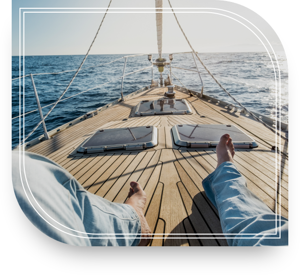 Man relaxing on a sailboat after securing Fifth Third Investment Management services.